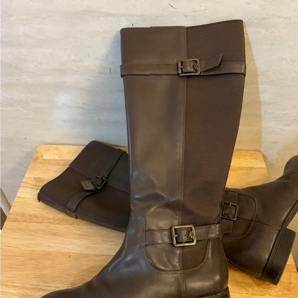 Isaac Mizrahi Live brown leather knee-high riding boots.
